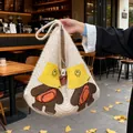 Chic cream knitted tote bag featuring cute cartoon bear patches and wide shoulder strap - Off White