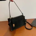 Retro black faux suede square shoulder bag with gold rivets and metallic hardware - Black