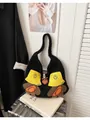 Cute black fuzzy knit shoulder bag with smile patches and a wooden horn toggle closure - Black