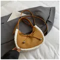 Brown suede crescent bag with white faux fur trim and bow detail for women - Brown