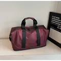 Große weinrote Reisetasche aus wasserdichtem Nylon mit separatem Schuhfach unten - Burgunderrot