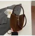 Dark brown suede bucket bag with white contrast stitching and adjustable leather strap - Coffee No Charm