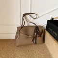 Khaki brown lychee leather handbag with metal buckle and dachshund charm detail - Elephant Gray With Dog Charm / Elephant Grey