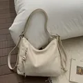 Versatile off-white PU leather tote bag with lychee texture and multiple straps - White With Pendant