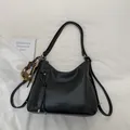 Black versatile leather tote bag for women featuring a tassel and cute bear pendant - Black without Pendant