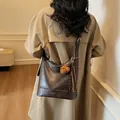 Deep brown retro tote bag with adjustable strap and bear charm accessory in casual style - With Pendant / Coffee