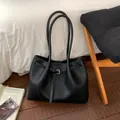 Classic black tote bag with litchi texture and silver buckle for women's daily commute - Black