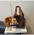 Vintage brown leather bucket bag with orange handle and cute plush bear charm decoration - With Pendant / Coffee With Pendant