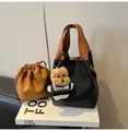 Retro black and brown leather bucket bag with teddy bear charm and drawstring pouch - With Pendant / Black With Pendant