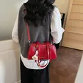 Retro red glossy leather tote bag with a white flower charm and thin shoulder straps - With Pendant / Red