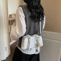 Chic white patent leather Boston tote bag with floral charm and adjustable strap - White