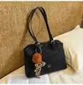 Black matte shoulder tote bag with brown plush pom-pom and leopard print ribbon detail - Black With Pendant