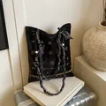 Black suede tote bag with golden floral embroidery and paisley printed handles - Black with Scarf