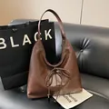 Dark brown PU leather tote bag with bow detail in a slouchy minimalist Hobo style - Brown