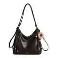 Deep brown leather backpack with glossy finish and cute plush ball pendant detail - With Charm / Coffee