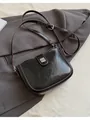 Borsa a tracolla minimalista in pelle cerata nera con bordi marroni e fibbia argentata - Nero (Senza Ciondolo)