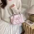 Secchiello rosa chiaro lucido con fibbia annodata e manico superiore da donna - Rosa