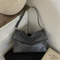 Minimalist dark grey tote bag with vintage wrinkled texture and metal eyelet details - Grey without Pendant