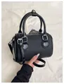 Chic black color-block boston bag with top handles and adjustable strap for women - Black