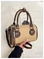 Bolso Boston de lona caqui con ribete de cuero marrón y correa ajustable - Caqui