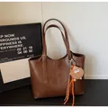 Large capacity vintage tote bag in dark brown matte leather with adjustable straps - With Pendant / Brown