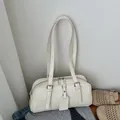 Bolso Boston minimalista en cuero blanco crema con correas y herrajes plateados - Blanco