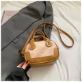 Pink and brown minimalist crossbody bag on a gray suit jacket with book decor - Pink Without Pendant