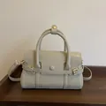 Elegant cream leather handbag with dual top handles and gold hardware in variant color - Gray