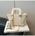 Chic cream pleated bucket bag with tassel charm and silver H hardware detail - White