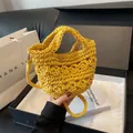 Handmade yellow crochet bucket bag with woven straps and inner lining for beach vacations - Yellow