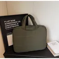 Army green quilted minimalist laptop bag with white grid stitching and dual handles - Green