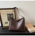 Vintage dark brown large hobo bag with adjustable strap and sleek leather finish - Brown
