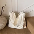Minimalist off-white large nylon tote bag with braided rope detail and card holder charm - White