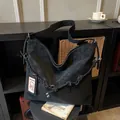 Large black suede hobo shoulder bag with woven rope details and casual daily design - Black