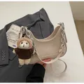 Chic beige half-moon shoulder bag with silver chain and cute teddy bear charm - With Pendant / Off White