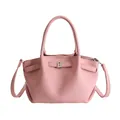 Sac seau élégant en cuir rose clair grainé avec fermoir argenté et poignée haute - Rose