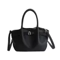 Chic black litchi pattern bucket bag with silver twist lock and crossbody strap - Black