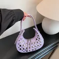 Lavender purple half-moon shoulder bag with silver studs and smooth PU leather finish - Purple