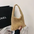 Handmade beige mesh tote bag with intricate hollow woven pattern for casual summer beach use - Khaki