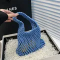 Handmade blue hollow knit mesh tote bag made of durable cotton rope for beach or daily use - Blue