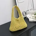 Handmade yellow hollow mesh crochet handbag with elegant curved handle for beach vacation - Yellow