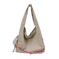 Minimalist khaki canvas tote bag with colorful braided rope strap and spacious design - Off White