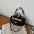 Bolso Boston de nailon negro con cremallera amarilla y asas de cuerda coloridas - Negro