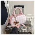 Pink checkered pillow bag with rocking horse charm and adjustable strap for crossbody wear - With Horse Charm / Pink