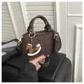 Dark brown plaid Boston bag with a small horse charm and adjustable shoulder strap - With Horse Charm / Brown