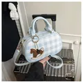 Light blue plaid mini Boston bag with crossbody strap and horse charm detail - With Horse Charm / Blue