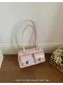Sac sous le bras rétro rose clair en similicuir brillant avec deux poches avant - Sans pendentif / Rose