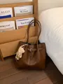 Dark brown faux leather tote bag for women with decorative strap and plush bear pendant - With Charm / Brown
