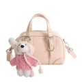 Pink minimalist Boston pillow bag with cute plush puppy charm and textured leather - With Pendant / Pink
