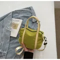 Chic lime green canvas tote bag with cream straps and adjustable crossbody shoulder belt - Small Green